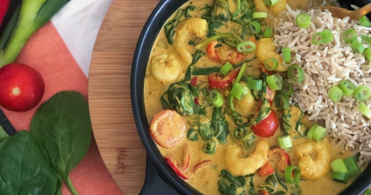 Gele curry met garnalen en spinazie